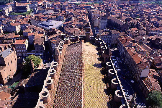 The vast Roman-tiled roof, viewed from the summit of the clocher.