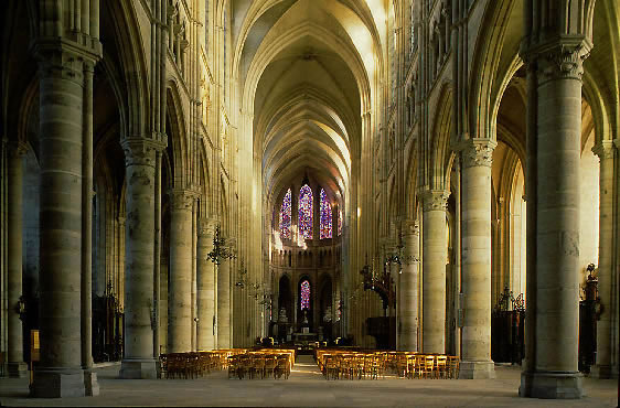 The serene interior, possibly the model for Chartres, gives little hint of the damage sustained during two world wars.